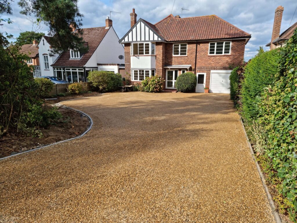 This is a newly installed tar and chip driveway installed by Wickham Market Driveways